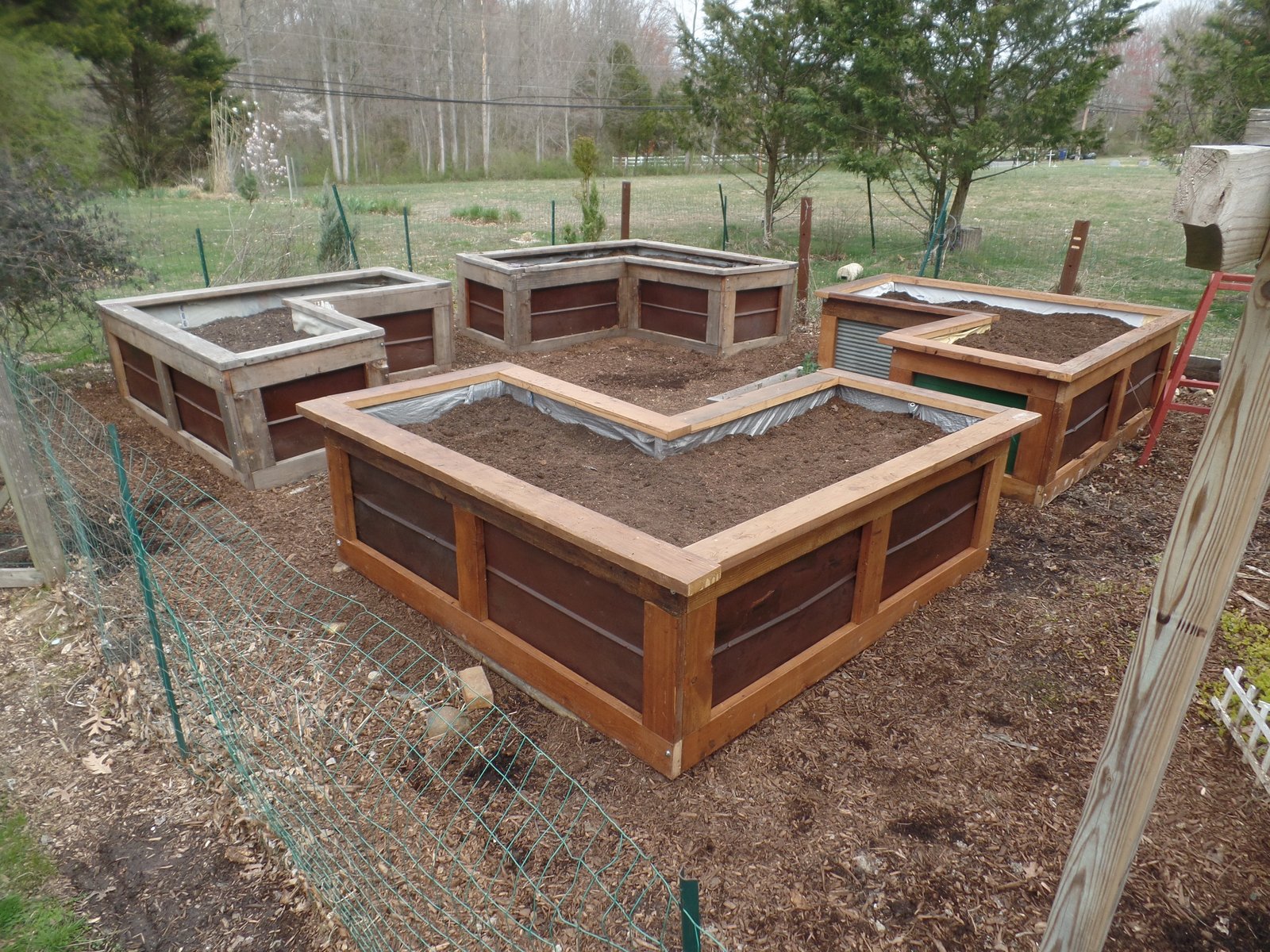 raised-garden-beds-from-reused-roofing-old-school-joes